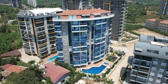 Modern 1+1 Fully Furnished Apartment in Blue Tower, Mahmutlar – Ideal Investment or Vacation Home